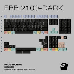 A top-down layout of a mechanical keyboard keycap set labeled FBB 2100-DARK, showing black keycaps with pastel-colored legends and symbols arranged on a light gray background. Text at the bottom reads 'MADE IN CHINA' and 'DESIGN BY FBB', with a small FBB logo in the lower right.