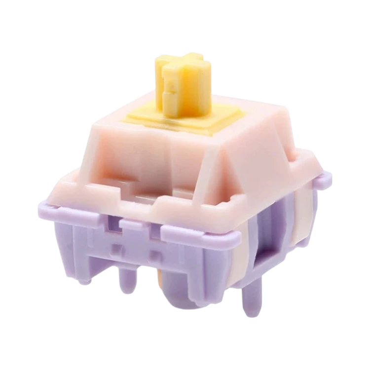 OZO Keyboards MMD Princess V2 mechanical keyboard switch with a yellow stem, pink top housing, and purple base.