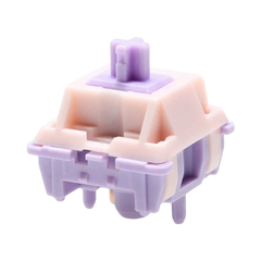 OZO Keyboards MMD Princess V2 mechanical switch with a light purple stem and pink and purple housing