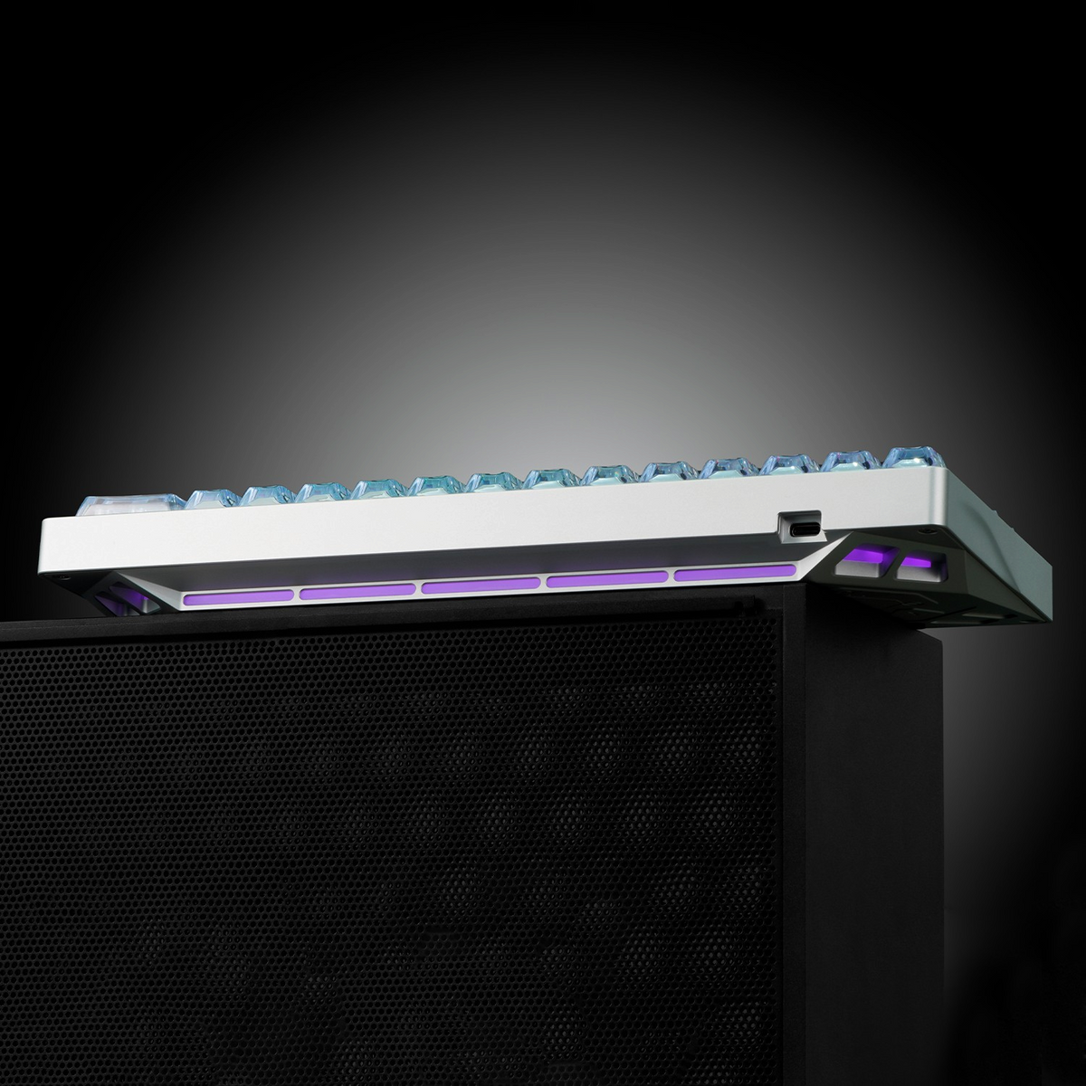 OZO Keyboards SF60 Diamond Edition mechanical keyboard with silver frame, blue keycaps, and purple side lighting.