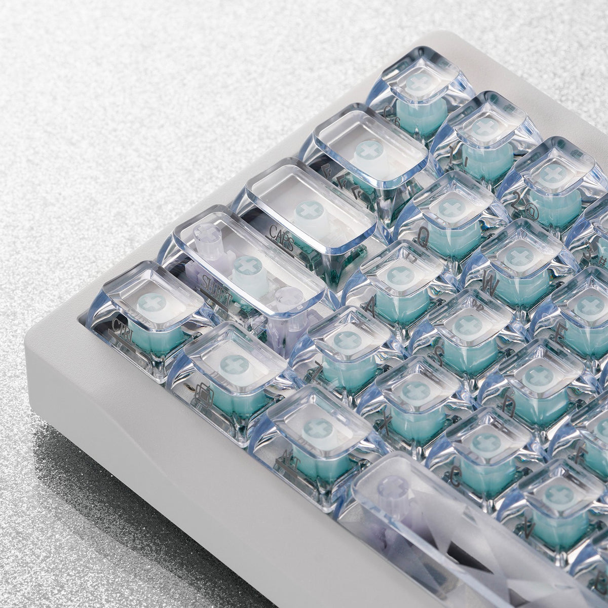 OZO Keyboards SF60 Diamond Edition mechanical keyboard with transparent keycaps and visible teal hall effect switches