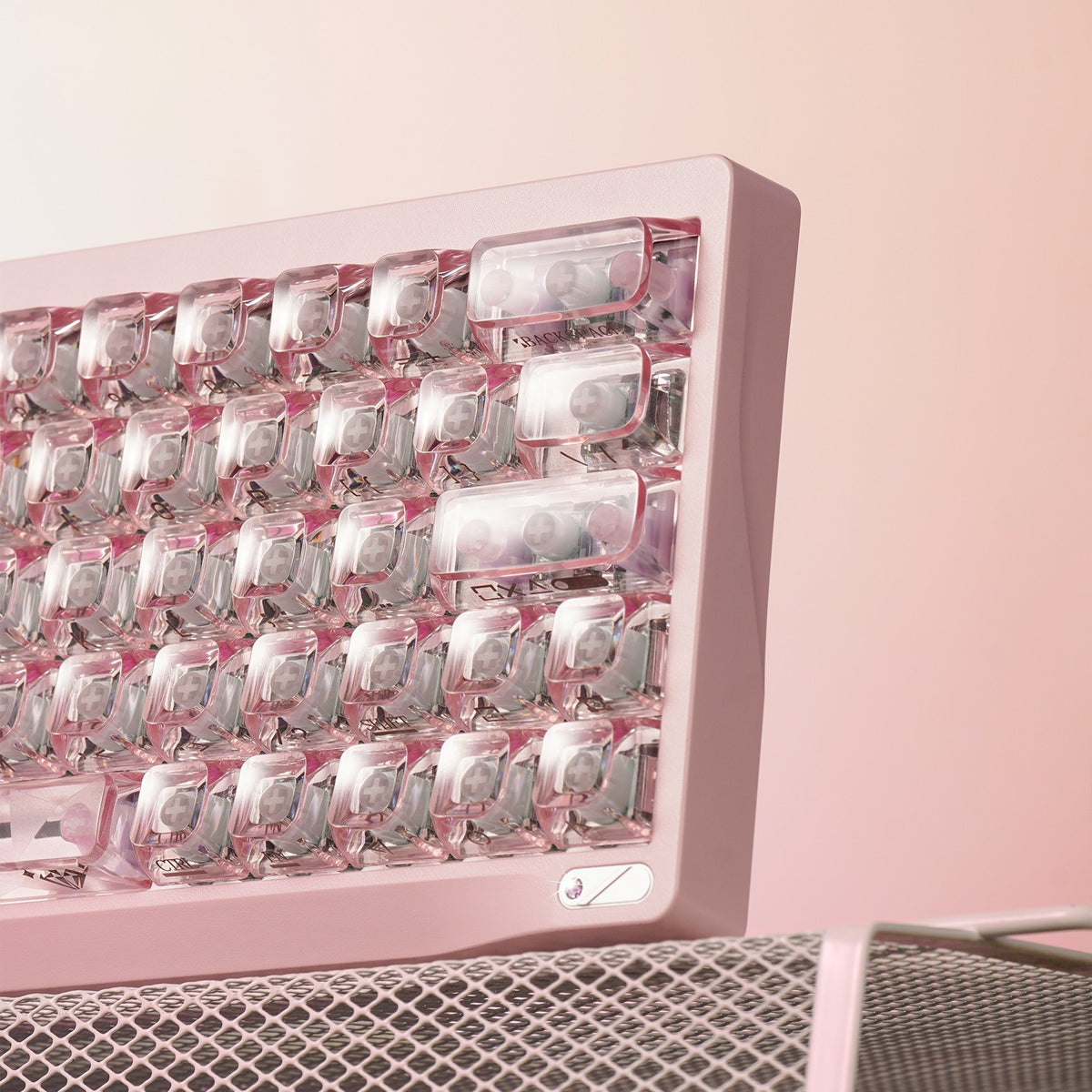 OZO Keyboards SF60 Diamond Edition mechanical keyboard with transparent keycaps and a soft pink frame