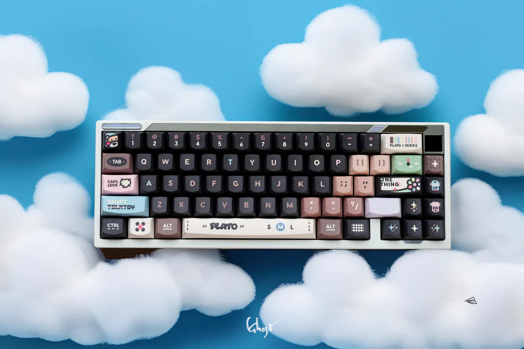 Keyboard with colorful keycaps on a blue background with clouds