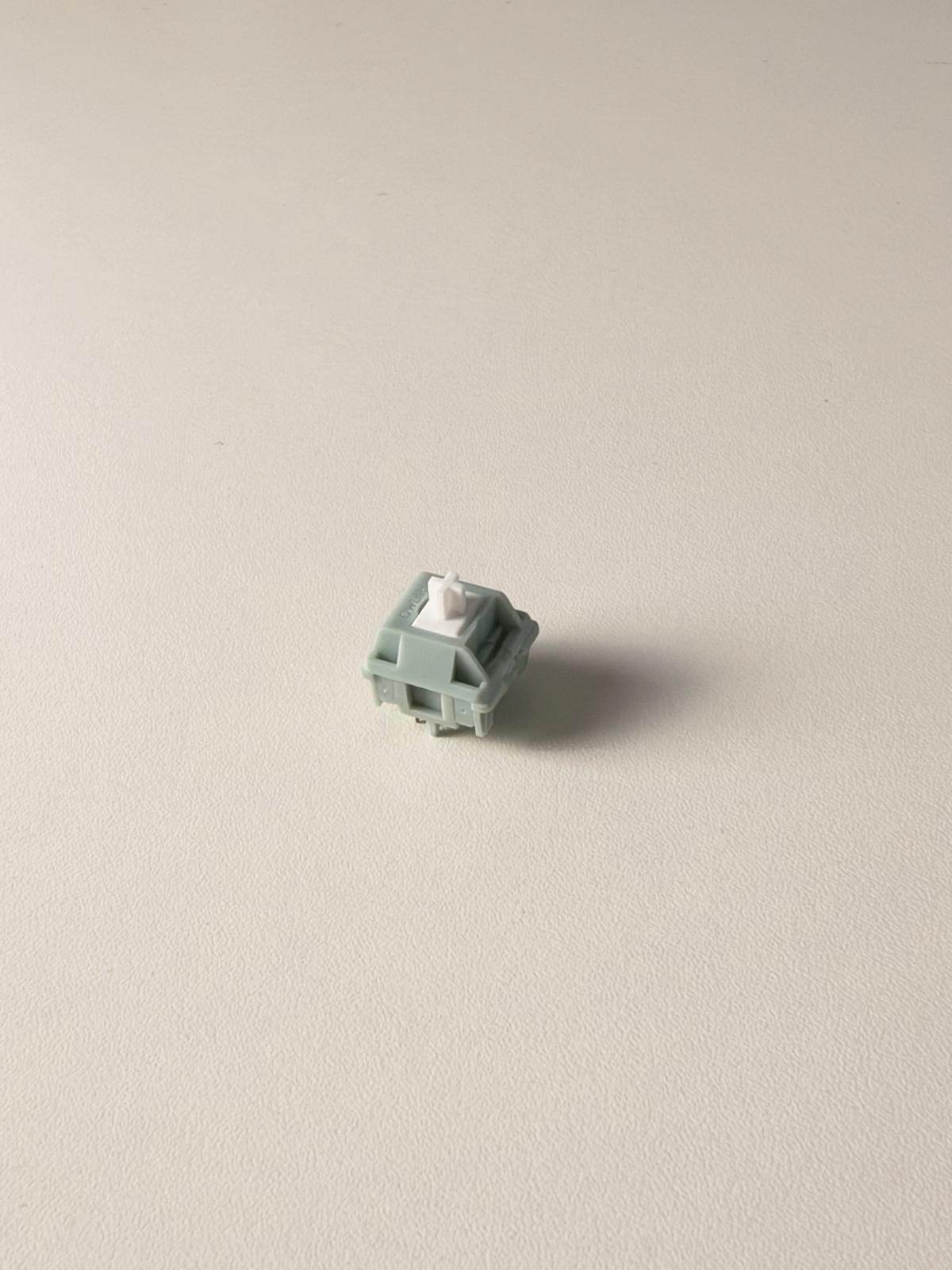 OZO Keyboards OwLab London Fog linear mechanical keyboard switch with a grey polycarbonate housing and white UPE stem
