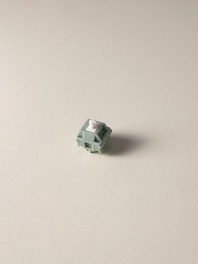 OZO Keyboards OwLab London Fog linear mechanical keyboard switch with a grey polycarbonate housing and white UPE stem