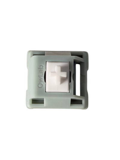OZO Keyboards OwLab London Fog linear mechanical switch with a grey polycarbonate housing and white long-pole stem.
