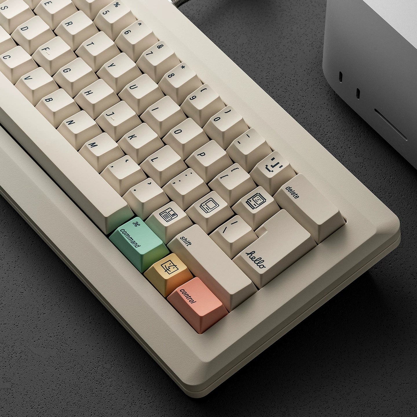 Close-up of a mechanical keyboard with colorful keycaps on a dark surface
