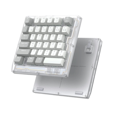 HK35 one handed magnetic keyboard, Phantom clear case with white and grey keycaps, angled view with bottom plate 