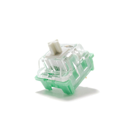 Green mechanical switch on a white background