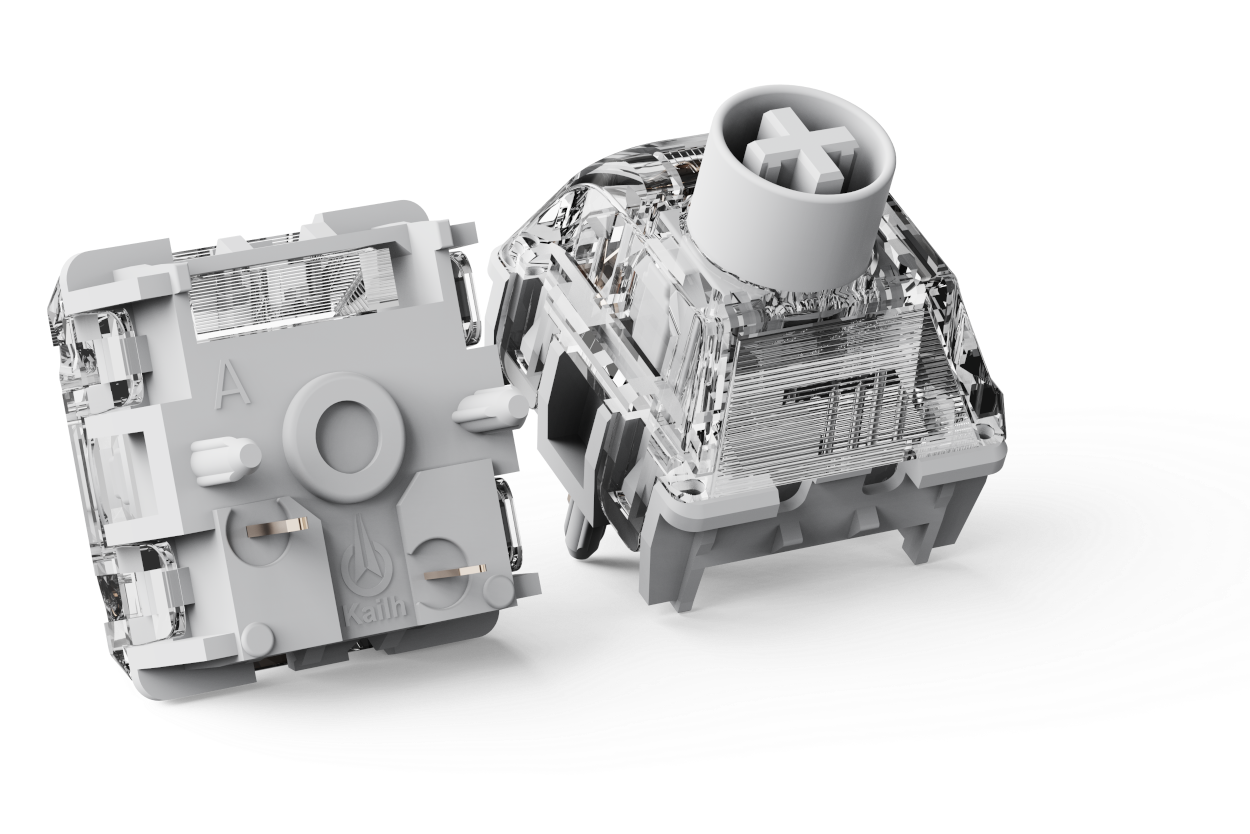 Two grey mechanical keyboard switch components shown on a clean white background.