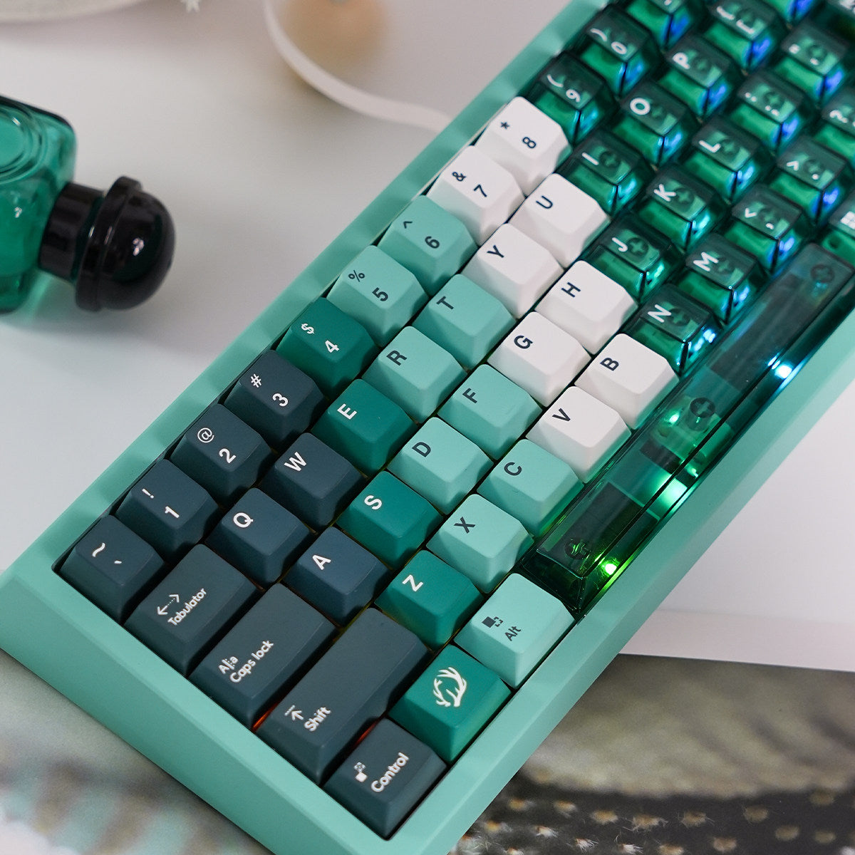 Mintcaps PBT and translucent PC keycap set in green.