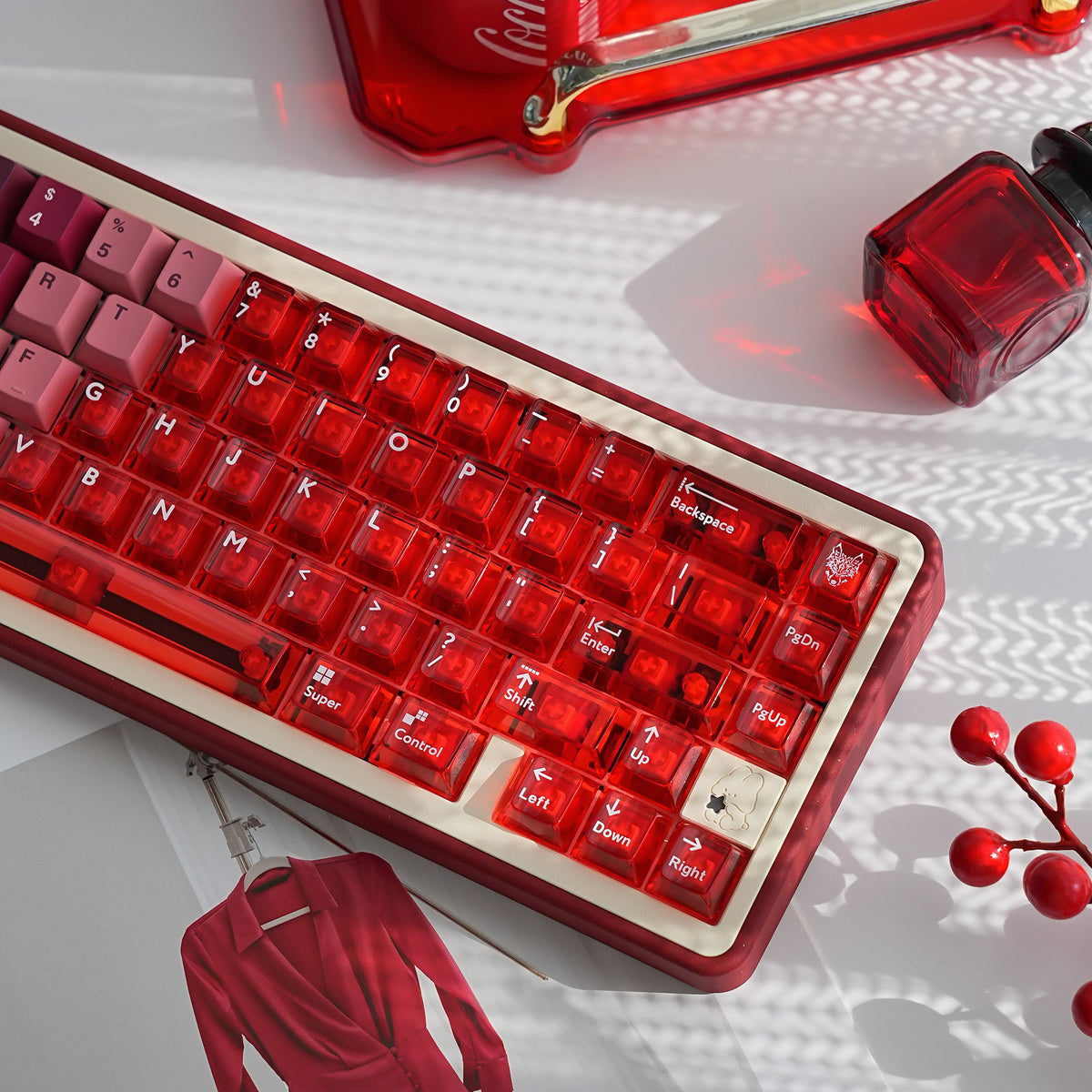 Mintcaps PBT and translucent PC keycap set in red.