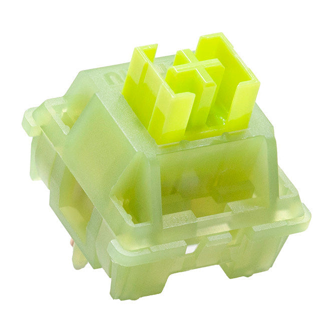 Light green mechanical keyboard switch on a white background