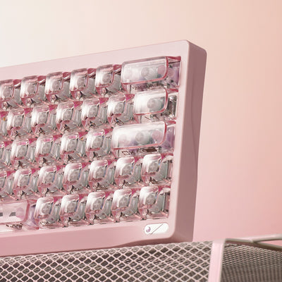 OZO Keyboards SF60 Diamond Edition mechanical keyboard with transparent keycaps and a soft pink frame